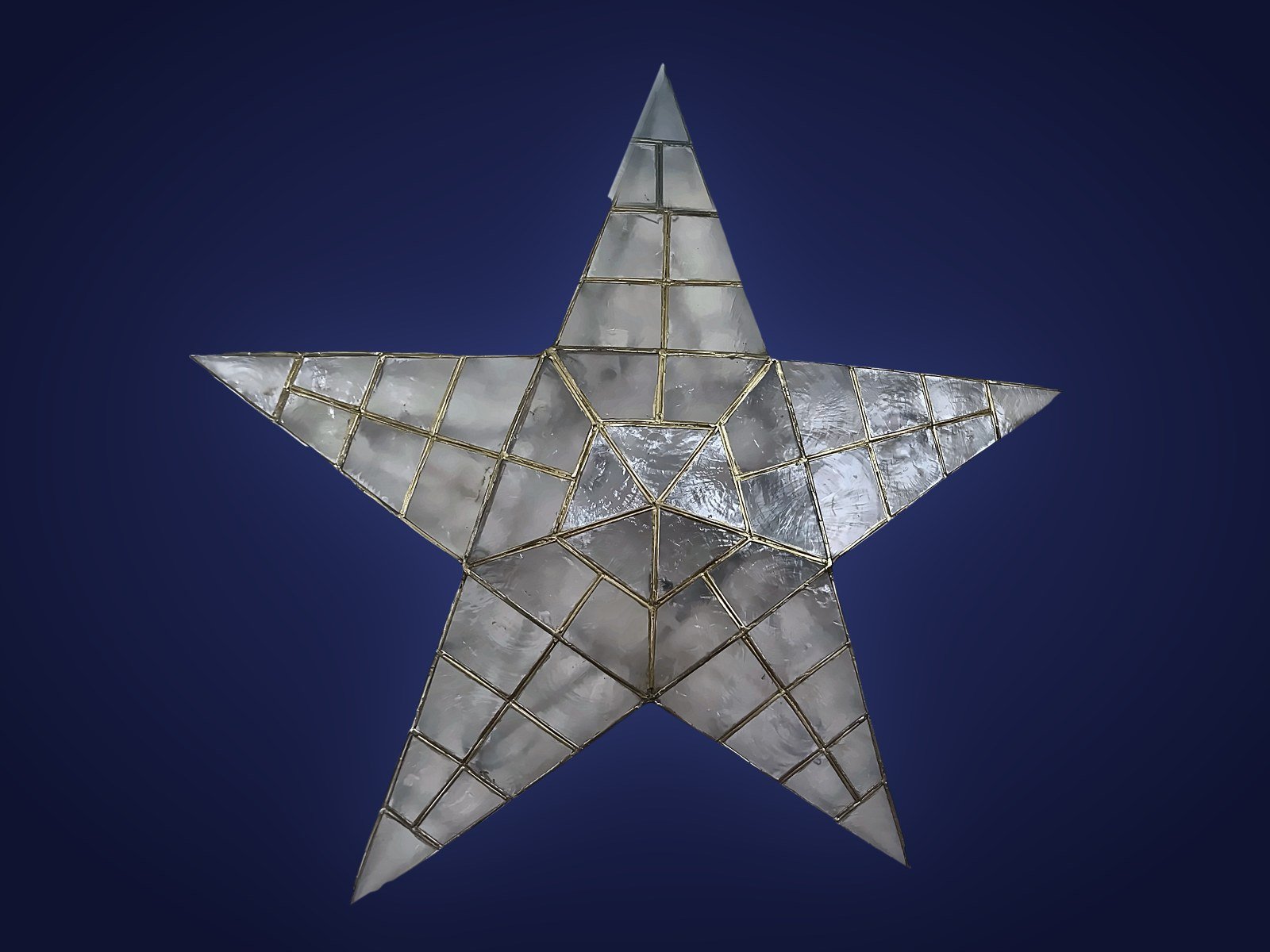 Handcrafted capiz star parol in a brass-toned frame
